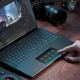 The ZenBook Pro 15 has a 15.6-inch OLED screen up top and a 5.65-inch LCD screen/touchpad down below.